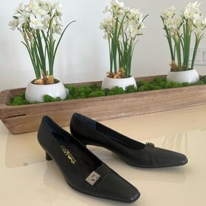 Ferragamo black heels with silver hardware size 8 AA 
narrow.